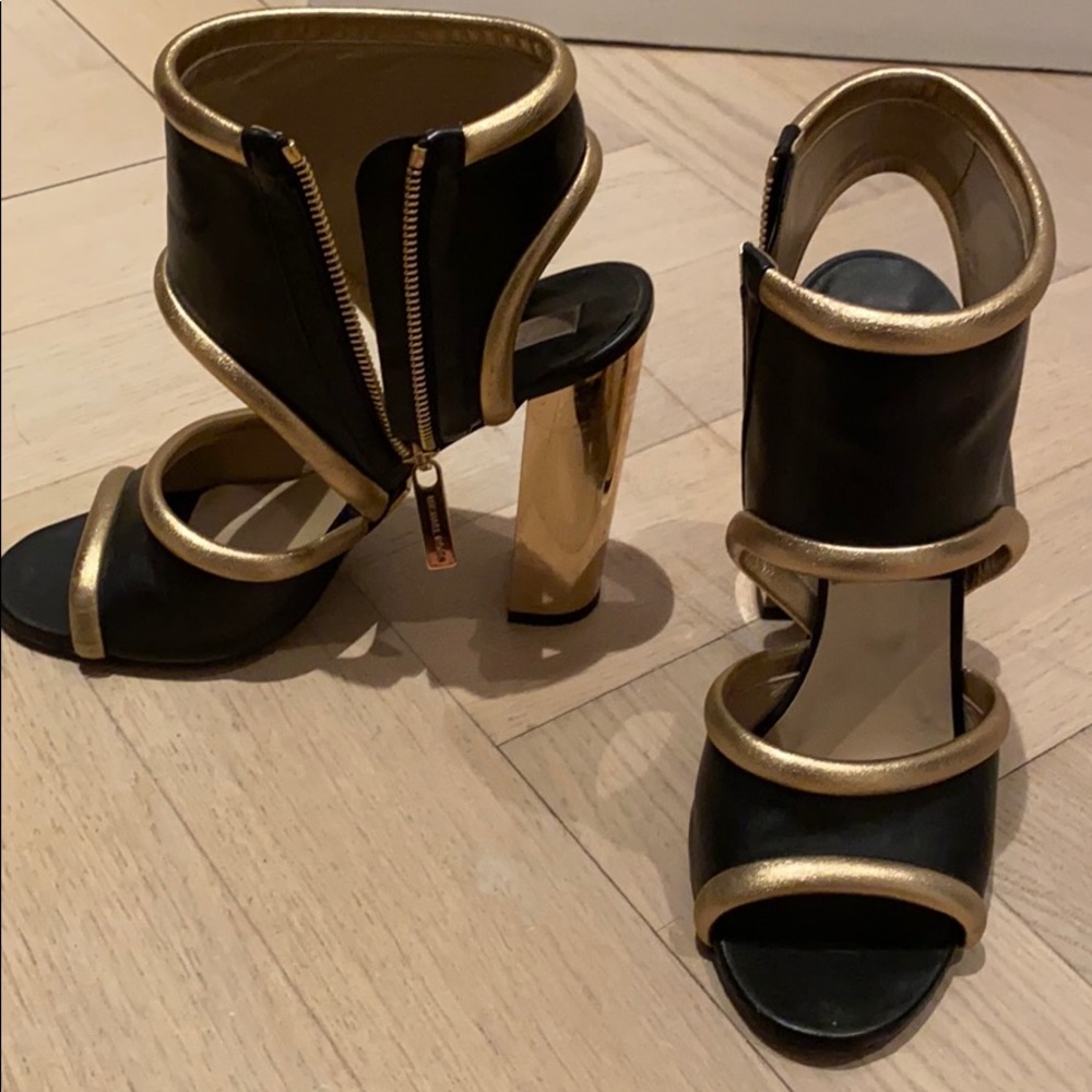 Michael Kors black and gold heels.